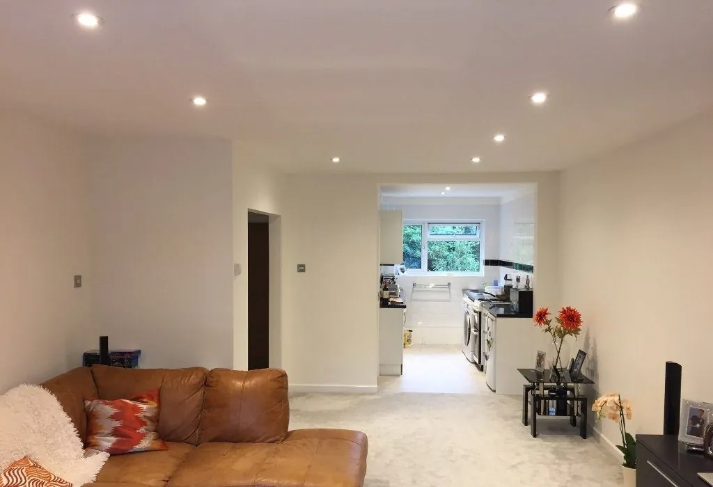 Domestic living room and kitchen after drylining and decorating in Poole