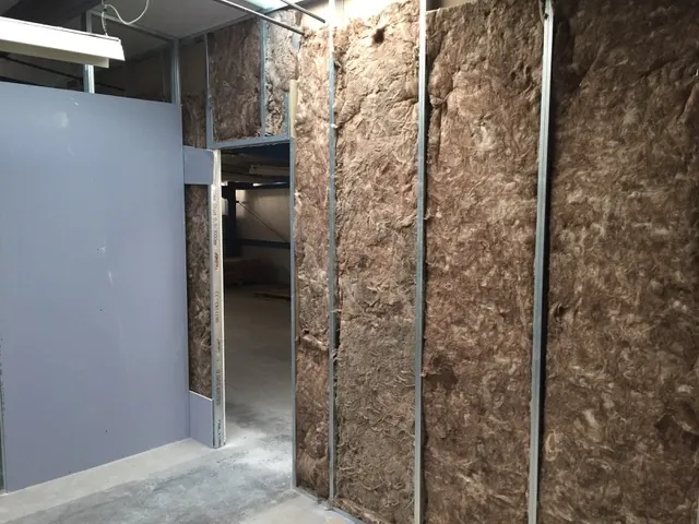 Metal stud wall construction with acoustic insulation on a Bournemouth site