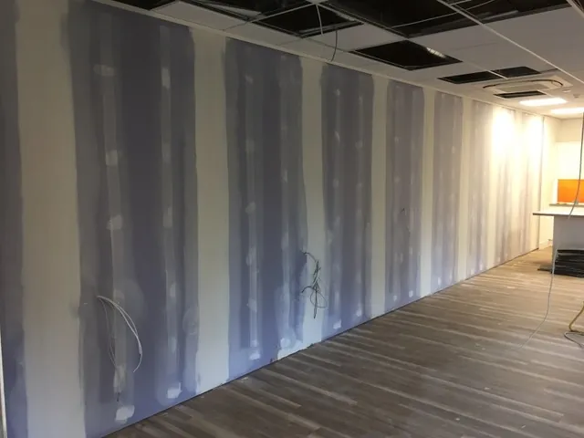 Plasterboard wall taped and jointed ready for decoration on a Poole fit-out